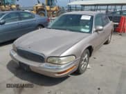 ✅ 1999 Buick Park Avenue • VIN: 1G4CW52K1X4623987 • Lot: 43083638. Wystawiony na IAAI z przebiegiem 129 010 mil. Bezpłatny archiwum sprzedaży aukcyjnych z USA i szczegółowy raport historii pojazdu na DreamBid. Zdjęcie 2.