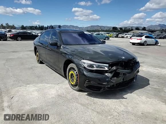 ✅ 2018 BMW 7 Series 750i • VIN: WBA7F0C5XJGM23016 • Лот: 51284255. Опубликован ранее на Copart с пробегом 69 460 миль. Бесплатный доступ к архиву аукционных продаж из США и подробный отчёт об истории автомобиля на DreamBid. Изображение 10.