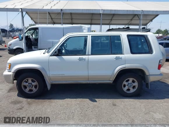 ✅ 2000 Isuzu Trooper S • VIN: JACDS58X8Y7J12668 • Лот: 42655530. Опубликован ранее на IAAI с пробегом 130 094 миль. Бесплатный доступ к архиву аукционных продаж из США и подробный отчёт об истории автомобиля на DreamBid. Изображение 14.