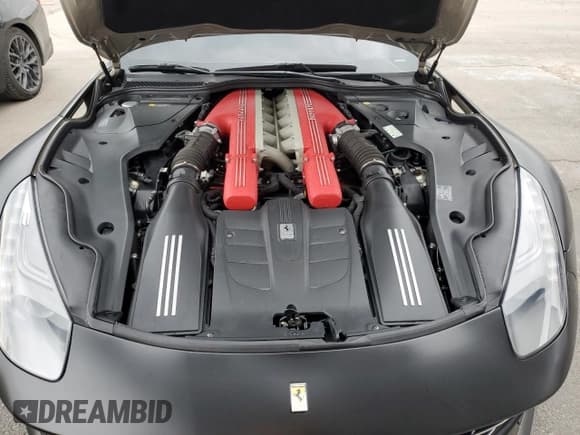 ✅ 2014 Ferrari F12 • VIN: ZFF74UFAXE0202704 • Лот: 57329915. Опубликован ранее на Copart с пробегом 17 783 миль. Бесплатный доступ к архиву аукционных продаж из США и подробный отчёт об истории автомобиля на DreamBid. Изображение 11.