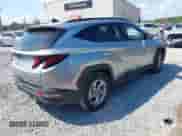 2024 Hyundai Tucson SEL with VIN 5NMJB3DE4RH404311, listed as a IAAI auction lot 43266957 with 53,728 mi miles and . Bid and sale history available at DreamBid. Image 4.