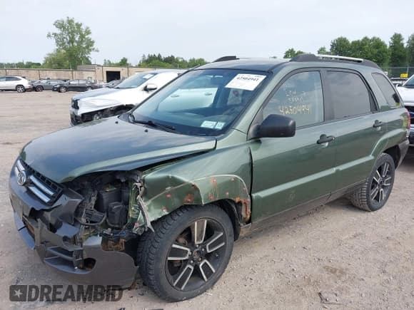 ✅ 2005 Kia Sportage LX • VIN: KNDJF723957081534 • Лот: 42504941. Опубликован ранее на IAAI с пробегом 135 026 миль. Бесплатный доступ к архиву аукционных продаж из США и подробный отчёт об истории автомобиля на DreamBid. Изображение 2.