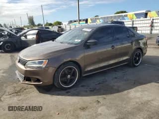 ✅ 2014 Volkswagen Jetta S • VIN: 3VW2K7AJ8EM251045 • Lot: 90817515. Listed on Copart with 126,678 mi. Free auction sales archive from the USA and detailed vehicle history report at DreamBid. Image 1.