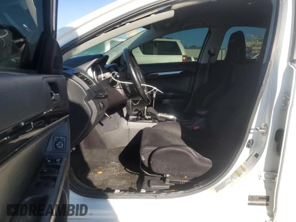 ✅ 2014 Mitsubishi Lancer Evolution GSR • VIN: JA32W8FV5EU023703 • Lot: 72744504. Listed on Copart with Not provided. Free auction sales archive from the USA and detailed vehicle history report at DreamBid. Image 7.