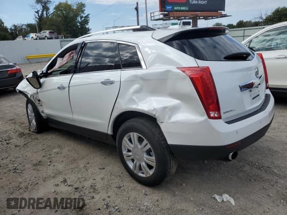 ✅ 2015 Cadillac SRX Luxury Collection • VIN: 3GYFNEE36FS557311 • Lot: 85869855. Listed on Copart with 68,700 mi. Free auction sales archive from the USA and detailed vehicle history report at DreamBid. Image 2.