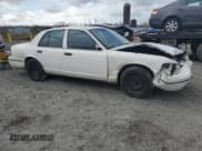 ✅ 1999 Ford Crown Victoria Police • VIN: 2FAFP71W6XX107511 • Lot: 44328975. Listed on Copart with 188,433 mi. Free auction sales archive from the USA and detailed vehicle history report at DreamBid. Image 4.