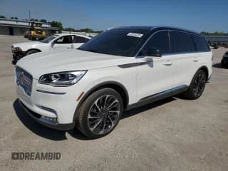 ✅ 2024 Lincoln Aviator Reserve • VIN: 5LM5J7WC9RGL01098 • Lot: 53320235. Listed on Copart with 13,659 mi. Free auction sales archive from the USA and detailed vehicle history report at DreamBid. Image 1.