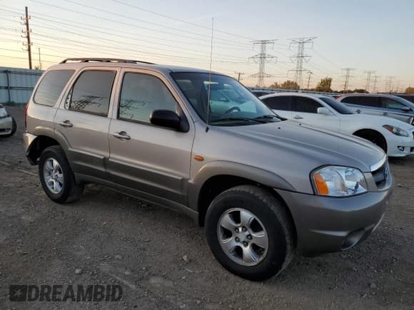 ✅ 2002 Mazda Tribute LX • VIN: 4F2YU09142KM22895 • Lot: 73797364. Wystawiony na Copart z przebiegiem 176 514 mil. Bezpłatny archiwum sprzedaży aukcyjnych z USA i szczegółowy raport historii pojazdu na DreamBid. Zdjęcie 4.