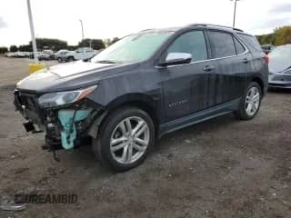 2019 Chevrolet Equinox Premier с VIN 2GNAXYEX0K6190551, выставлен на аукционе Copart как лот 86658495 с пробегом 74 797 миль миль и Списание • Salvage title. История ставок и продаж доступна на DreamBid. Изображение 1.