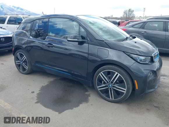 ✅ 2015 BMW i3 • VIN: WBY1Z4C57FV501034 • Lot: 41950152. Listed on IAAI with 47,207 mi. Free auction sales archive from the USA and detailed vehicle history report at DreamBid. Image 1.
