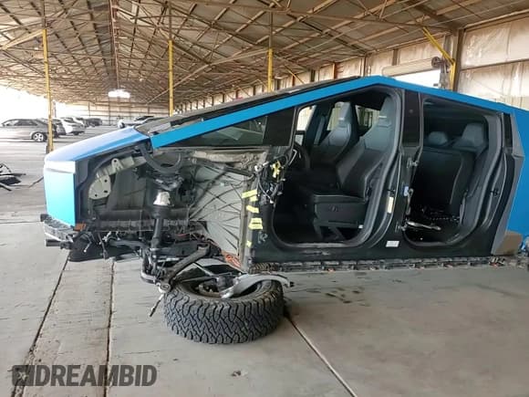 ✅ 2024 Tesla Cybertruck • VIN: 7G2CEHED4RA016087 • Lot: 81776175. Listed on Copart with 42,426 mi. Free auction sales archive from the USA and detailed vehicle history report at DreamBid. Image 13.