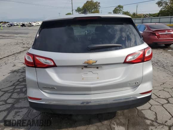 2018 Chevrolet Equinox LT с VIN 2GNAXJEV2J6219875, выставлен на аукционе Copart как лот 81449735 с пробегом 260 398 миль миль и Списание • Salvage title. История ставок и продаж доступна на DreamBid. Изображение 6.