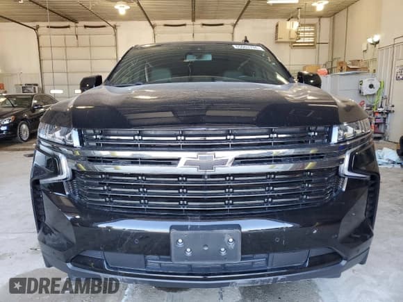 ✅ 2022 Chevrolet Suburban RST • VIN: 1GNSKEKD8NR206595 • Lot: 65003794. Wystawiony na Copart z przebiegiem 34 559 mil. Bezpłatny archiwum sprzedaży aukcyjnych z USA i szczegółowy raport historii pojazdu na DreamBid. Zdjęcie 5.