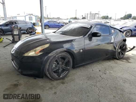 ✅ 2009 Nissan 370Z Touring • VIN: JN1AZ44E59M401771 • Lot: 71959725. Listed on Copart with 85,677 mi. Free auction sales archive from the USA and detailed vehicle history report at DreamBid. Image 1.