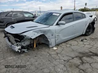 ✅ 2022 Dodge Charger SRT Hellcat Widebody • VIN: 2C3CDXL91NH100717 • Лот: 82333965. Опубликован ранее на Copart с пробегом 33 982 миль. Бесплатный доступ к архиву аукционных продаж из США и подробный отчёт об истории автомобиля на DreamBid. Изображение 1.