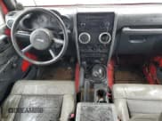 ✅ 2009 Jeep Wrangler X • VIN: 1J4FA241X9L778835 • Lot: 57457765. Listed on Copart with Not provided. Free auction sales archive from the USA and detailed vehicle history report at DreamBid. Image 8.