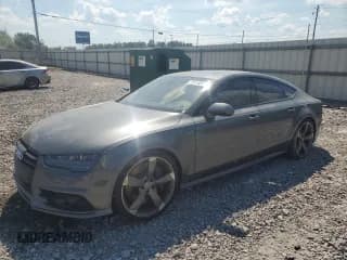 ✅ 2016 Audi S7 • VIN: WAUW2AFC6GN012949 • Lot: 72714074. Listed on Copart with Not provided. Free auction sales archive from the USA and detailed vehicle history report at DreamBid. Image 1.