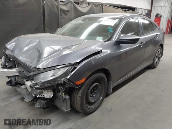✅ 2020 Honda Civic LX • VIN: 19XFC2F67LE006057 • Lot: 42032759. Listed on IAAI with 119,319 mi. Free auction sales archive from the USA and detailed vehicle history report at DreamBid. Image 2.