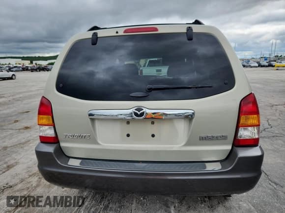 ✅ 2004 Mazda Tribute LX • VIN: 4F2YZ04164KM12932 • Lot: 58793955. Wystawiony na Copart z przebiegiem 127 219 mil. Bezpłatny archiwum sprzedaży aukcyjnych z USA i szczegółowy raport historii pojazdu na DreamBid. Zdjęcie 6.