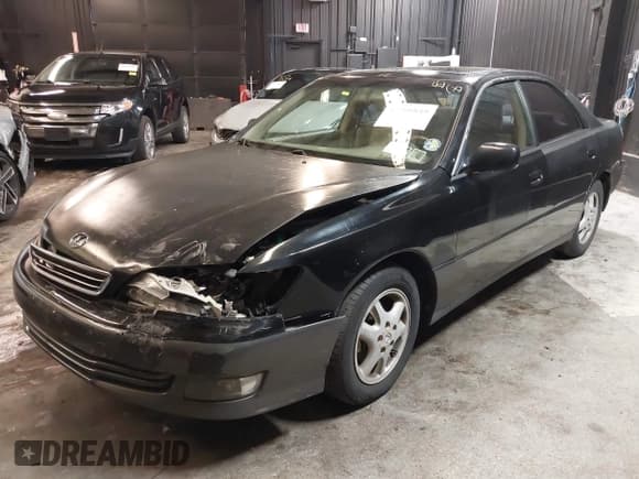 ✅ 2001 Lexus ES 300 • VIN: JT8BF28G415112517 • Lot: 42208849. Wystawiony na IAAI z przebiegiem 202 029 mil. Bezpłatny archiwum sprzedaży aukcyjnych z USA i szczegółowy raport historii pojazdu na DreamBid. Zdjęcie 19.