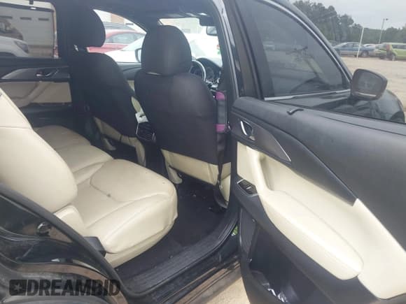 ✅ 2018 Mazda CX-9 Grand Touring • VIN: JM3TCADY9J0229571 • Lot: 43011548. Listed on IAAI with 147,896 mi. Free auction sales archive from the USA and detailed vehicle history report at DreamBid. Image 8.