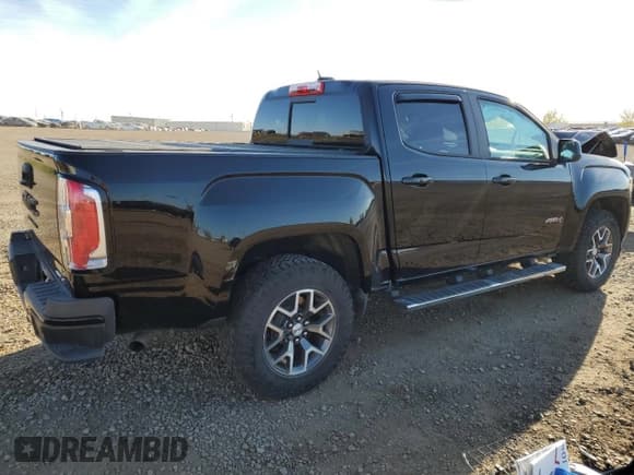 ✅ 2022 GMC Canyon 4WD AT4 • VIN: 1GTG6FEN4N1142812 • Lot: 84016745. Listed on Copart with 74,271 mi. Free auction sales archive from the USA and detailed vehicle history report at DreamBid. Image 3.