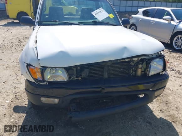 ✅ 2004 Toyota Tacoma • VIN: 5TENL42N74Z412936 • Lot: 42039092. Listed on IAAI with 289,926 mi. Free auction sales archive from the USA and detailed vehicle history report at DreamBid. Image 6.