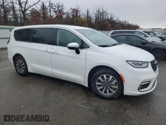 ✅ 2023 Chrysler Pacifica Hybrid Touring L • VIN: 2C4RC1L76PR523309 • Лот: 91471165. Опубликован ранее на Copart с пробегом 20 086 миль. Бесплатный доступ к архиву аукционных продаж из США и подробный отчёт об истории автомобиля на DreamBid. Изображение 4.