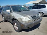 ✅ 2001 Lexus RX 300 • VIN: JTJGF10U210117096 • Lot: 43169294. Listed on IAAI with 203,037 mi. Free auction sales archive from the USA and detailed vehicle history report at DreamBid. Image 1.