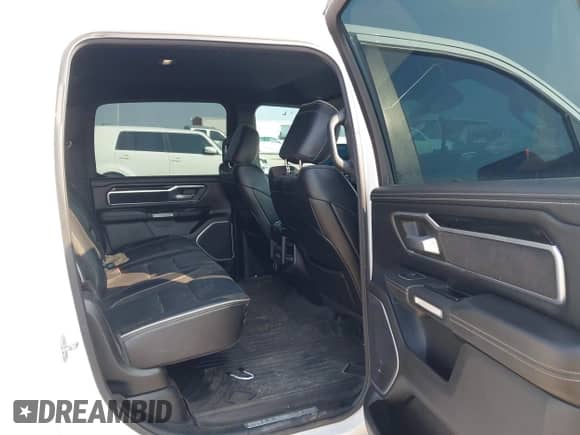 2022 Ram 1500 Laramie z VIN 1C6RREJM8NN169714, wystawiony jako IAAI lot #43076552 z przebiegiem 73 774 mil mil oraz . Historia ofert i sprzedaży dostępna na DreamBid. Obrazek 8.