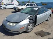 ✅ 2002 Saturn SC • VIN: 1G8ZY12722Z243236 • Лот: 42464967. Опубликован ранее на IAAI с пробегом 148 855 миль. Бесплатный доступ к архиву аукционных продаж из США и подробный отчёт об истории автомобиля на DreamBid. Изображение 2.