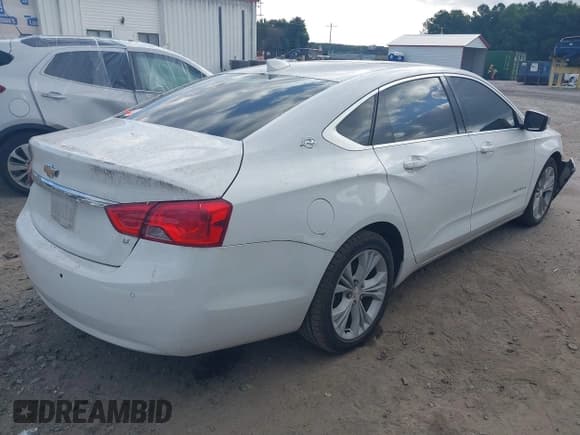✅ 2015 Chevrolet Impala LT • VIN: 2G1115SL5F9146987 • Lot: 40266576. Listed on IAAI with 141,786 mi. Free auction sales archive from the USA and detailed vehicle history report at DreamBid. Image 4.