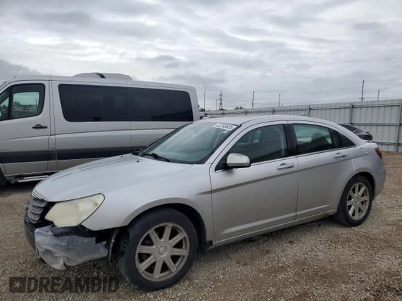 ✅ 2007 Chrysler Sebring Touring • VIN: 1C3LC56R77N528143 • Лот: 85285685. Опубликован ранее на Copart с пробегом 198 305 миль. Бесплатный доступ к архиву аукционных продаж из США и подробный отчёт об истории автомобиля на DreamBid. Изображение 1.