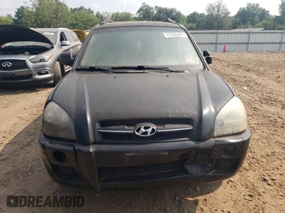 2005 Hyundai Tucson GL z VIN KM8JM12BX5U075930, wystawiony jako Copart lot #67500484 z przebiegiem 141 028 mil mil oraz Szkoda całkowita • Salvage title. Historia ofert i sprzedaży dostępna na DreamBid. Obrazek 5.