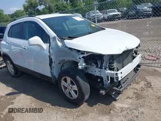 2018 Chevrolet Trax LT z VIN KL7CJPSB0JB661113, wystawiony jako IAAI lot #42927418 z przebiegiem 96 589 mil mil oraz . Historia ofert i sprzedaży dostępna na DreamBid. Obrazek 1.