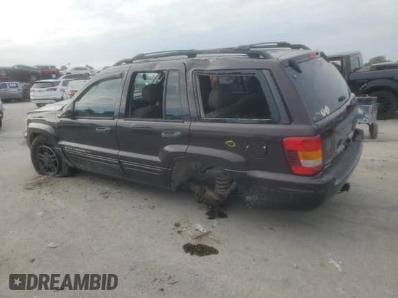 ✅ 2004 Jeep Grand Cherokee Laredo • VIN: 1J4GW48S44C266310 • Lot: 86520475. Listed on Copart with Not provided. Free auction sales archive from the USA and detailed vehicle history report at DreamBid. Image 2.