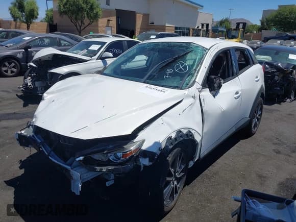 ✅ 2017 Mazda CX-3 Touring • VIN: JM1DKDC72H0165927 • Лот: 42691086. Опубликован ранее на IAAI с пробегом 92 440 миль. Бесплатный доступ к архиву аукционных продаж из США и подробный отчёт об истории автомобиля на DreamBid. Изображение 2.