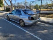 ✅ 2007 Subaru Impreza WRX STI • VIN: JF1GD76687L521862 • Lot: 48635285. Listed on Copart with 135,065 mi. Free auction sales archive from the USA and detailed vehicle history report at DreamBid. Image 3.