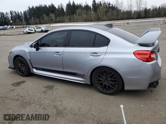 ✅ 2015 Subaru WRX STI • VIN: JF1VA2L62F9801585 • Лот: 45190095. Опубликован ранее на Copart с пробегом 48 546 миль. Бесплатный доступ к архиву аукционных продаж из США и подробный отчёт об истории автомобиля на DreamBid. Изображение 2.