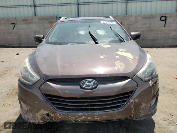 2014 Hyundai Tucson SE z VIN KM8JUCAG3EU813348, wystawiony jako Copart lot #61235045 z przebiegiem 77 597 mil mil oraz Szkoda całkowita • Salvage title. Historia ofert i sprzedaży dostępna na DreamBid. Obrazek 5.