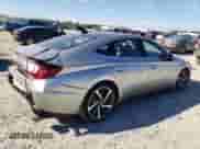 2022 Hyundai Sonata Sport z VIN 5NPEJ4J25NH140145, wystawiony jako Copart lot #87569595 z przebiegiem 26 203 mil mil oraz Szkoda całkowita • Salvage title. Historia ofert i sprzedaży dostępna na DreamBid. Obrazek 3.