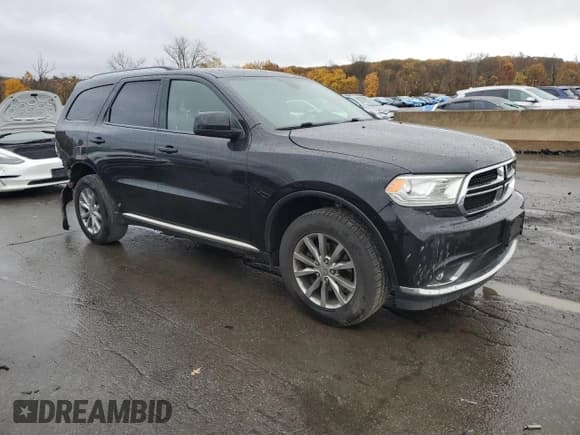 ✅ 2018 Dodge Durango SXT • VIN: 1C4RDJAG8JC248123 • Lot: 90479355. Listed on Copart with 139,994 mi. Free auction sales archive from the USA and detailed vehicle history report at DreamBid. Image 4.