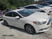 ✅ 2018 Ford Fusion SE • VIN: 3FA6P0HD7JR164785 • Lot: 81560745. Wystawiony na Copart z przebiegiem Nie podano. Bezpłatny archiwum sprzedaży aukcyjnych z USA i szczegółowy raport historii pojazdu na DreamBid. Zdjęcie 4.