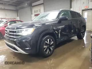 ✅ 2022 Volkswagen Atlas SE • VIN: 1V2LC2CA1NC204315 • Lot: 87311904. Listed on Copart with 33,766 mi. Free auction sales archive from the USA and detailed vehicle history report at DreamBid. Image 1.