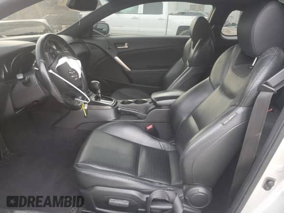 2013 Hyundai Genesis Coupe Grand Touring с VIN KMHHU6KJ1DU104409, выставлен на аукционе Copart как лот 82762984 с пробегом 92 130 миль миль и Списание • Salvage title. История ставок и продаж доступна на DreamBid. Изображение 7.