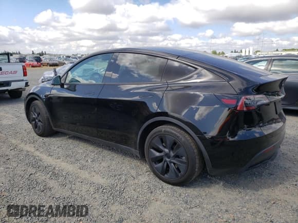 ✅ 2024 Tesla Model Y Long Range • VIN: 7SAYGAEE6RF127846 • Lot: 56968035. Listed on Copart with 23,328 mi. Free auction sales archive from the USA and detailed vehicle history report at DreamBid. Image 2.