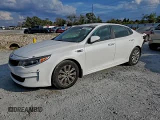✅ 2018 Kia Optima LX • VIN: 5XXGT4L31JG271880 • Lot: 94651935. Listed on Copart with 151,895 mi. Free auction sales archive from the USA and detailed vehicle history report at DreamBid. Image 1.