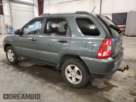 ✅ 2009 Kia Sportage LX • VIN: KNDJE723397602904 • Lot: 68704055. Wystawiony na Copart z przebiegiem 150 882 mil. Bezpłatny archiwum sprzedaży aukcyjnych z USA i szczegółowy raport historii pojazdu na DreamBid. Zdjęcie 2.