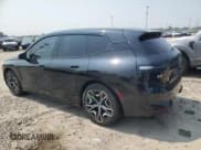 ✅ 2023 BMW iX • VIN: WB513CF06PCK76448 • Lot: 64732925. Listed on Copart with 103,966 mi. Free auction sales archive from the USA and detailed vehicle history report at DreamBid. Image 2.