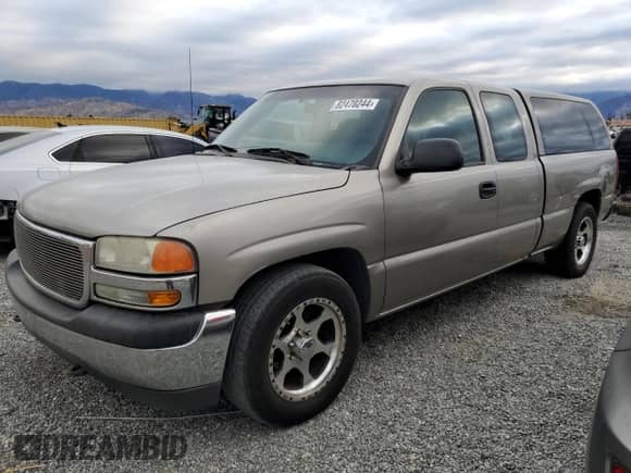 2001 GMC Sierra 1500 SLE1 with VIN 1GTEC19V41Z321666, listed as a Copart auction lot 82470244 with 220,830 mi miles and Clean title. Bid and sale history available at DreamBid. Image 1.